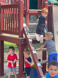 3's on the playground at Stepping Stones Child Care.