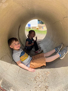 2 children playing together at Stepping Stones Child Care